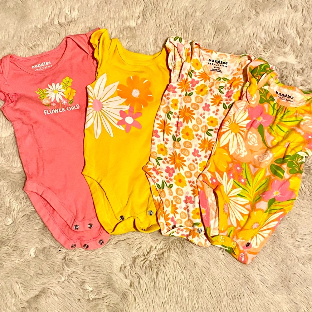 Bundle of Baby Onesies with Floral Designs
